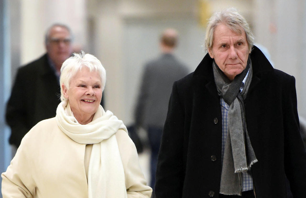 Dame Judi Dench's partner has joked she 'fell in love' with his squirrels before him
