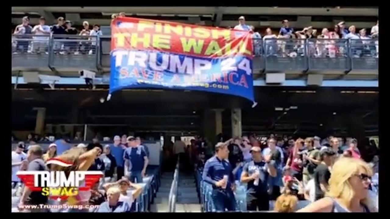 "FINISH THE WALL— TRUMP 2024" banner at Yankee Stadium