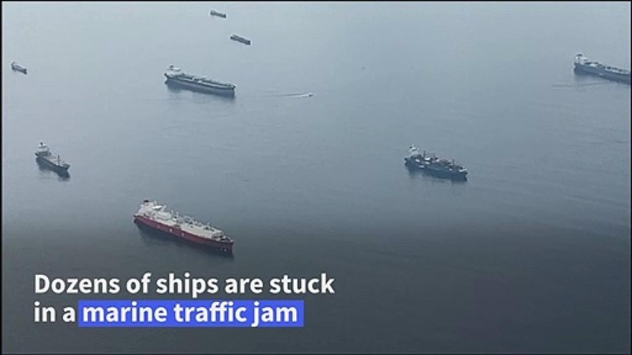 Dozens of ships wait to go through drought-hit Panama Canal