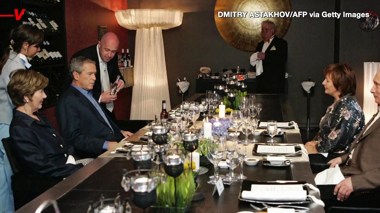 Photo Surfaces of Now Deceased Yevgeny Prigozhin Serving George W. Bush at Dinner Hosted By Vladimir Putin