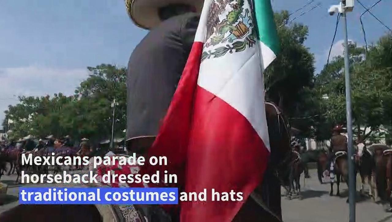 Mexicans parade on horseback to celebrate Charro Day