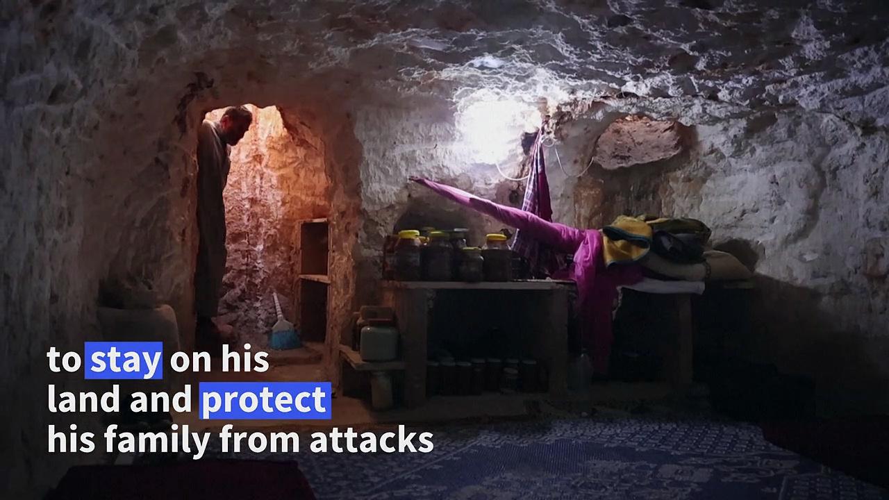 On the front line, Syrian family has dug its own shelter
