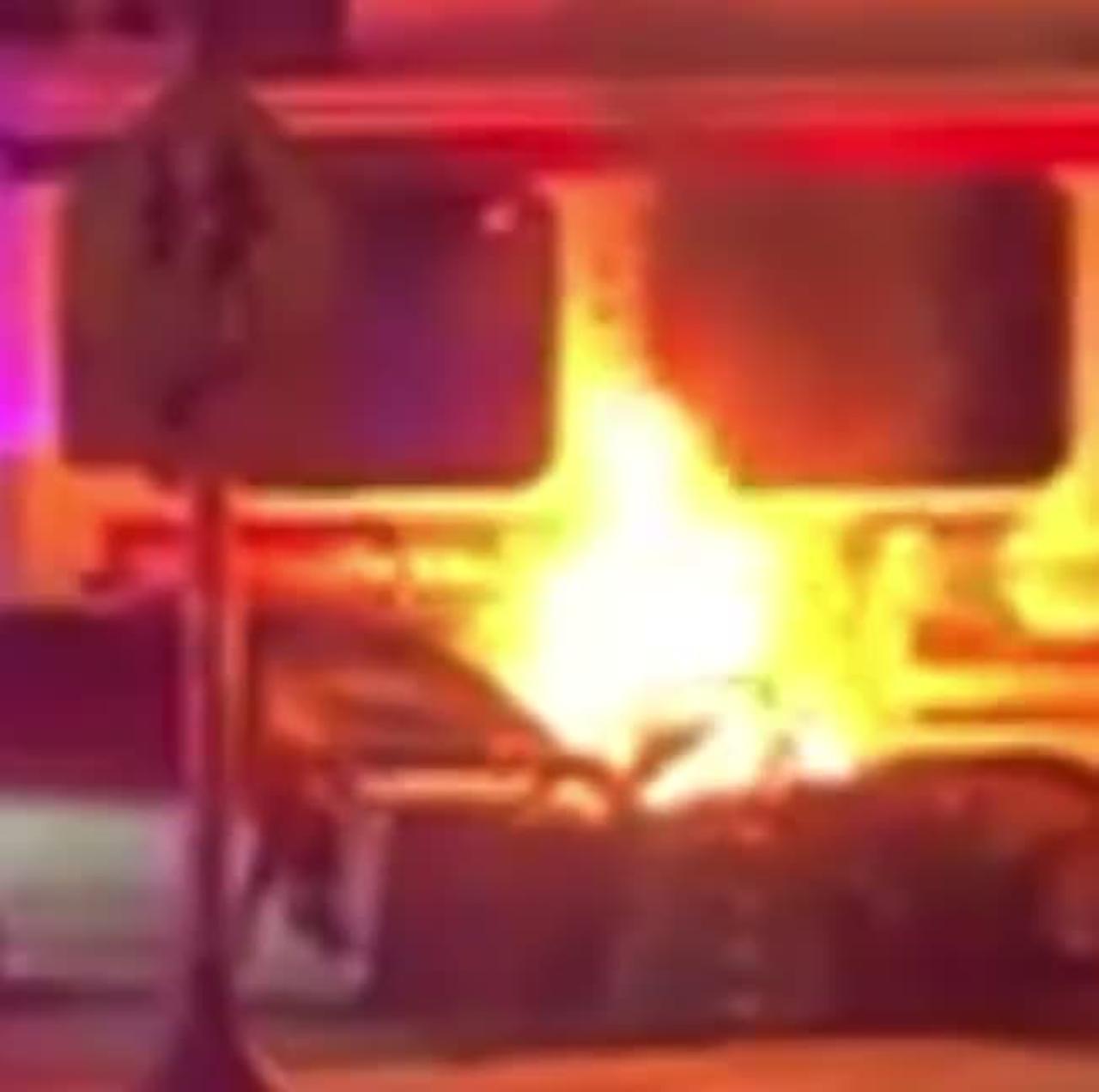 A driver has died after crashing into a SEPTA trolley and the vehicle catching fire, in West