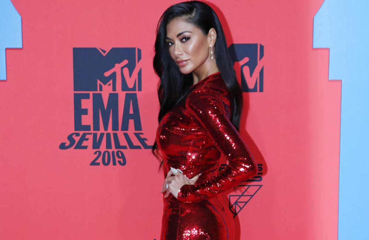 Nicole Scherzinger is happy to let her weight “fluctuate” after suffering for years with bulimia