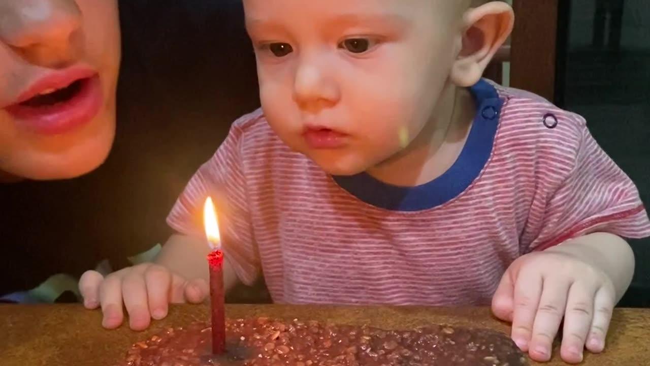 Brother Gets Distracted During Birthday Candle Blow Out
