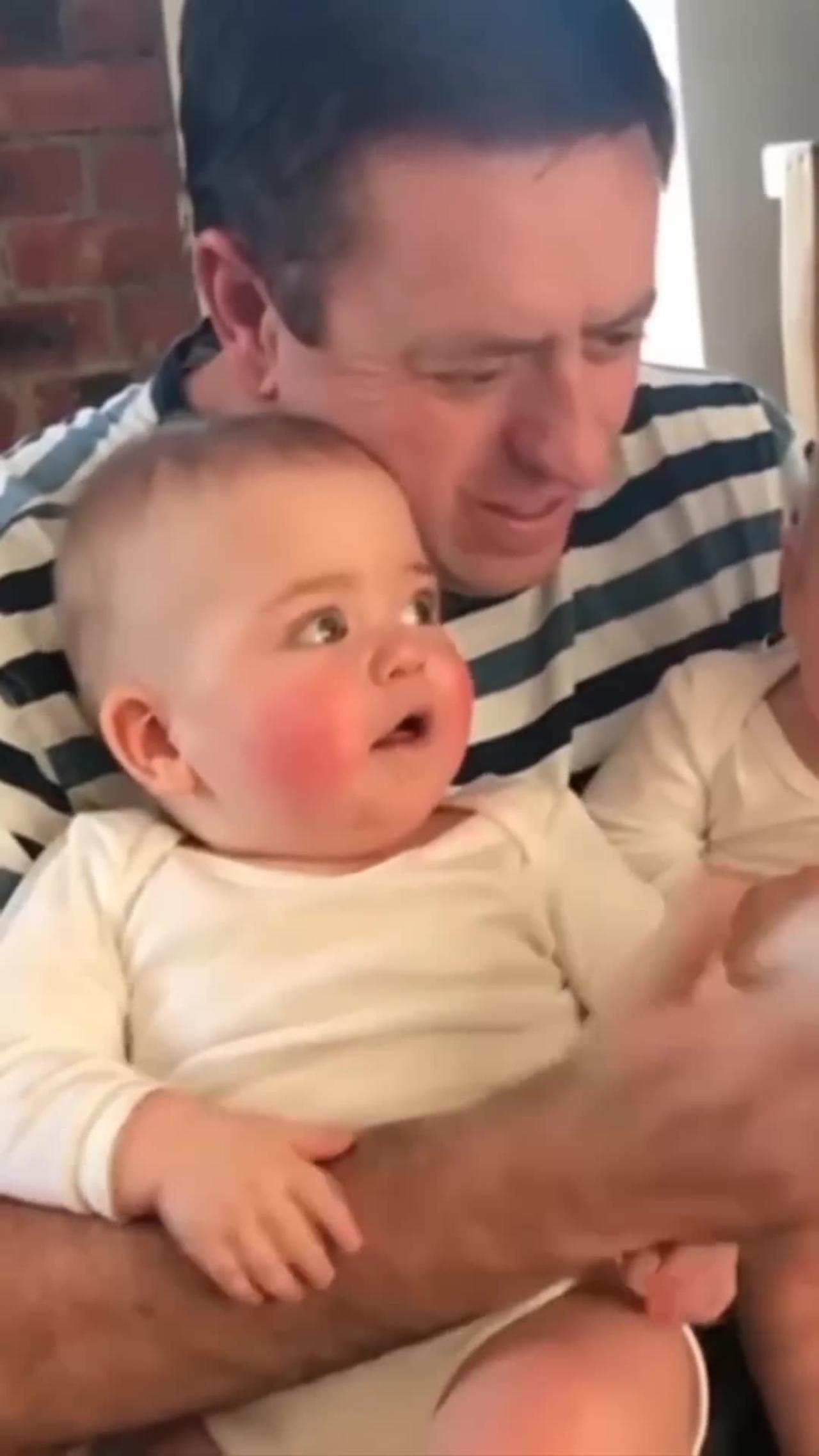 Mom and son playing One News Page VIDEO
