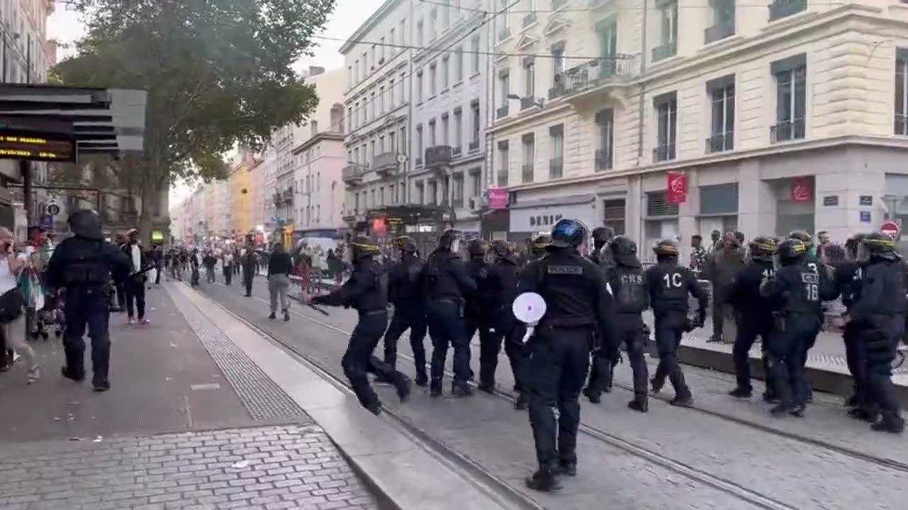 French police breaking up a demonstration by Hamas supporters in Paris