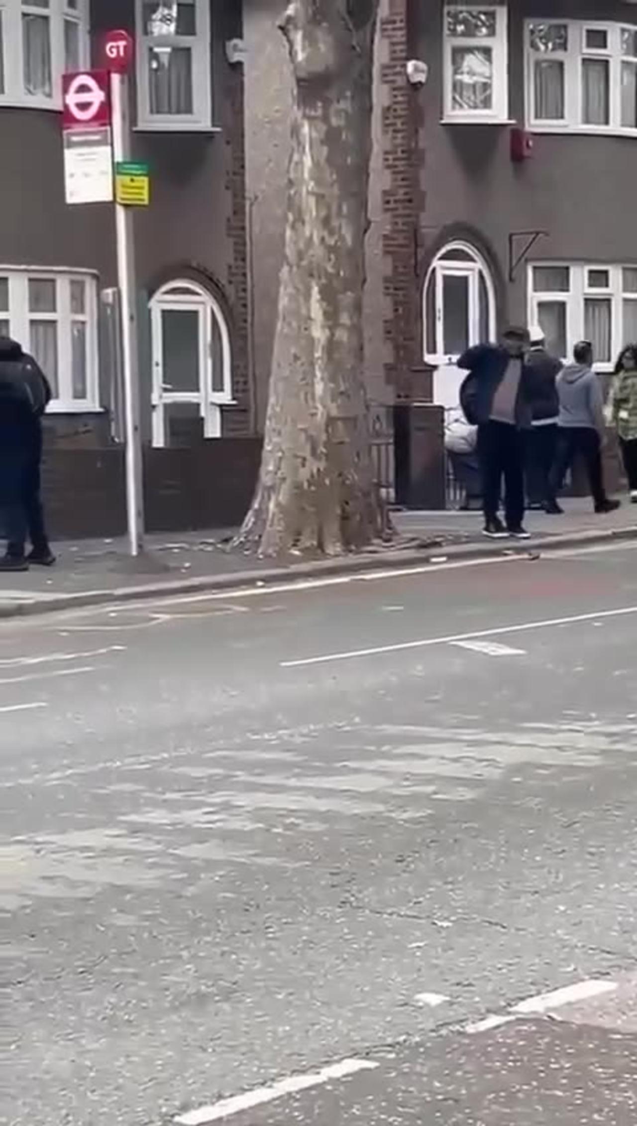 Armed police swooped on an East London college yesterday after two