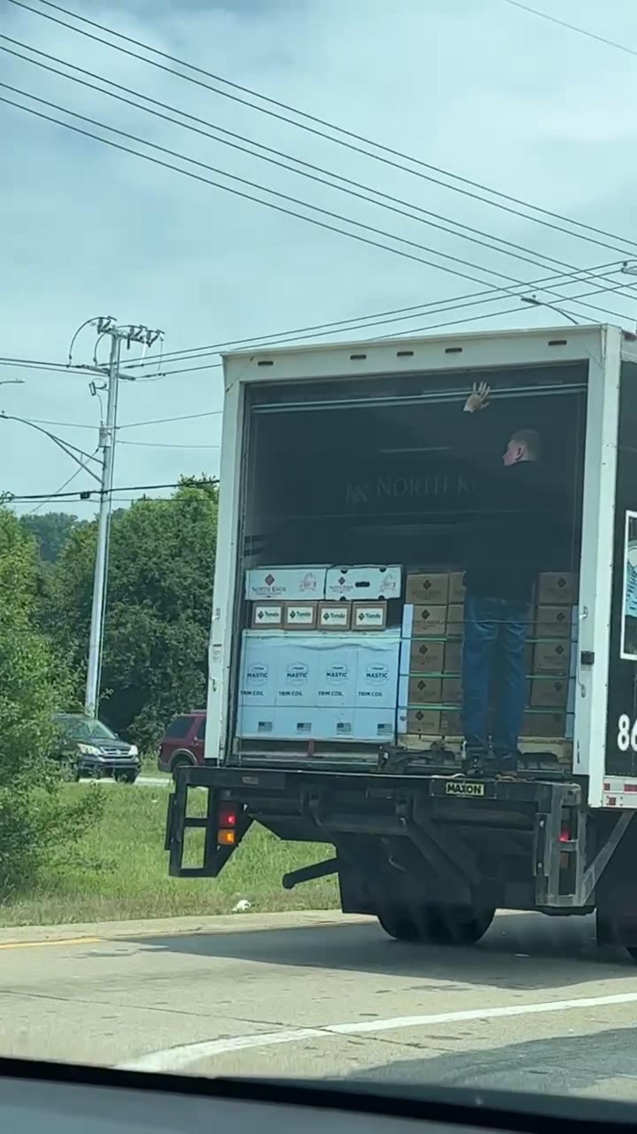 Open Door On A Moving Van