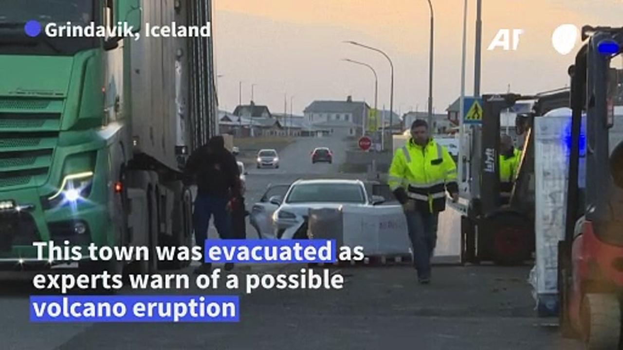 Evacuated residents collect belongings as Iceland eruption risk looms