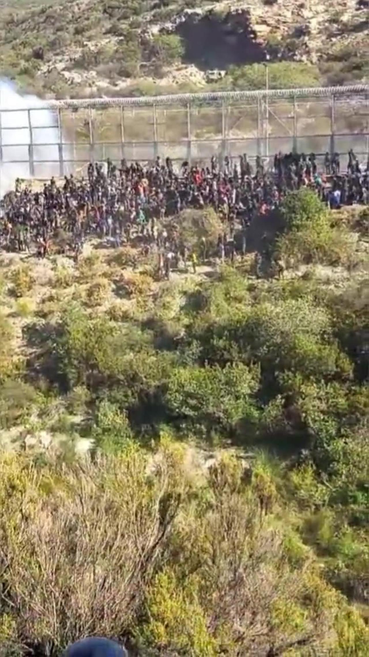 Migrants Rush Border Wall In Attempt To Gain Asylum/Work… In Spain