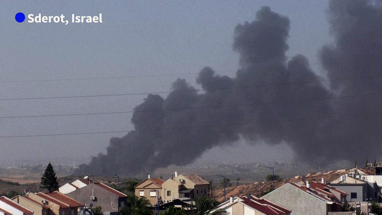 Smoke from a fire near Israel-Gaza border on day three of truce