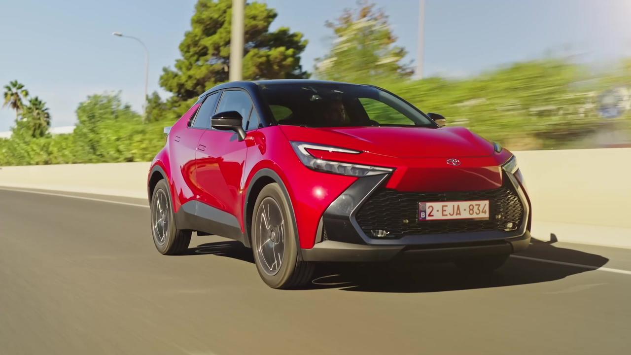 Toyota C-HR Electric Hybrid in Emotional Red Driving Video