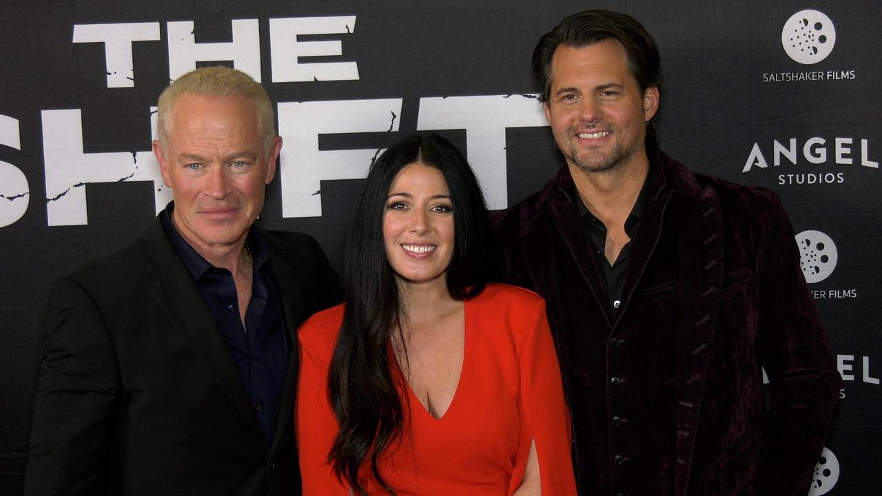 The cast of 'The Shift' pose together at their film premiere in Los Angeles