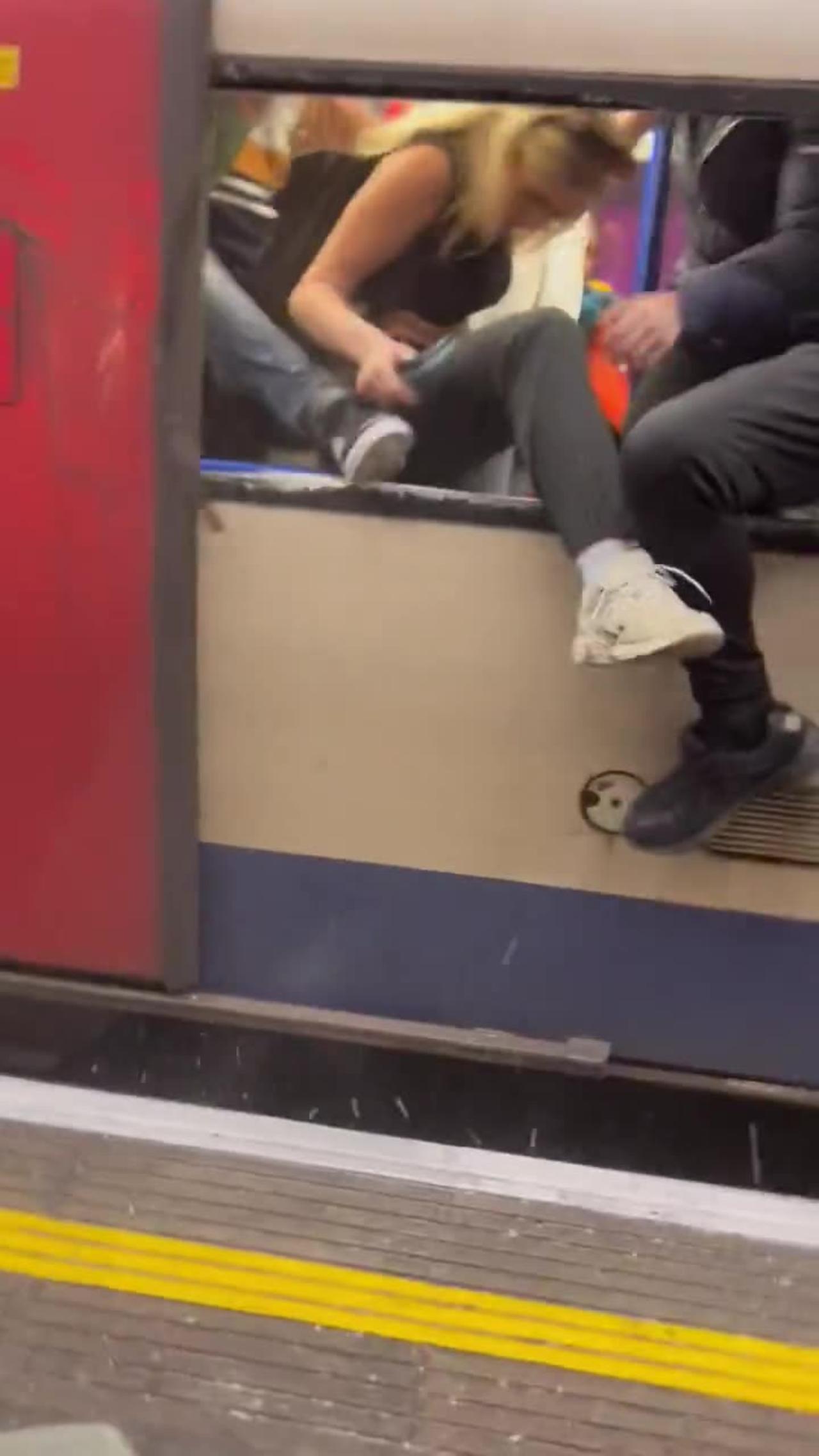 people desperately try to escape train filling with smoke