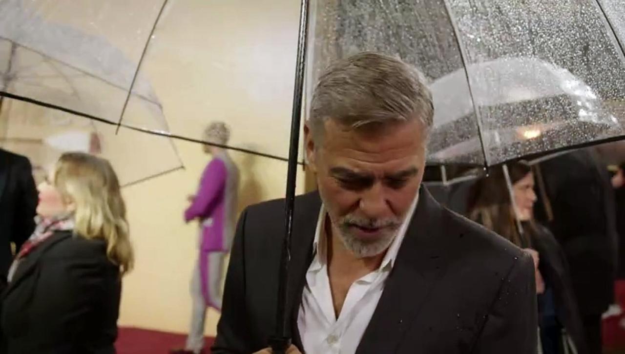 George Clooney Braves The Rain For The Boys In The Boat!