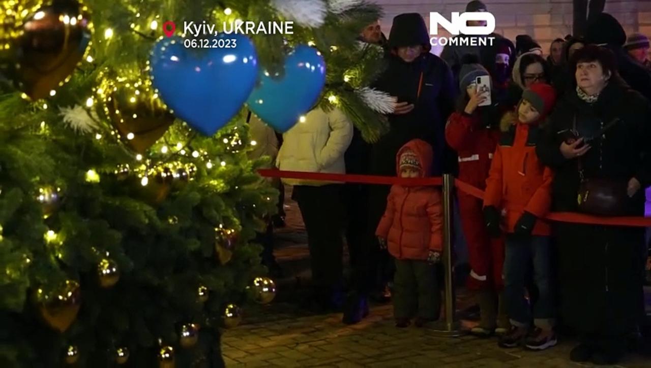 WATCH: Kyiv Christmas tree offers residents a rare moment of festivity