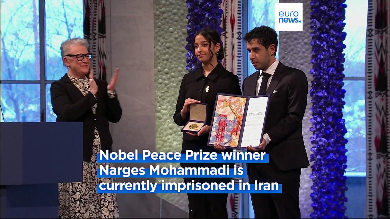 Children of imprisoned Iranian activist Narges Mohammadi accept Nobel Peace Prize on her behalf