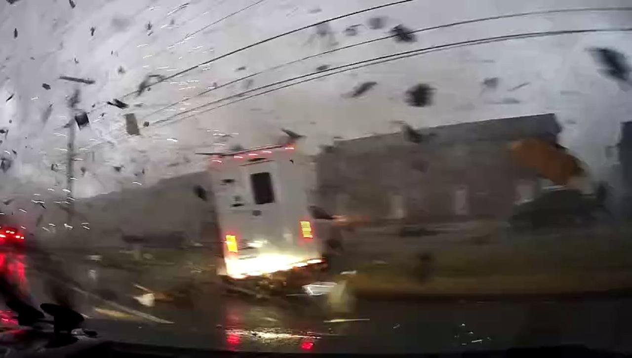 Must See! Tornado Touches Down on Top of Driver While Dash Cam Captures the Whole Thing on Video