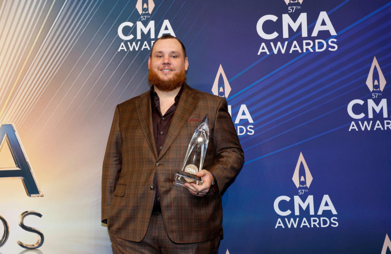 Luke Combs vows to help sick fan sued over conterfeit merchandise