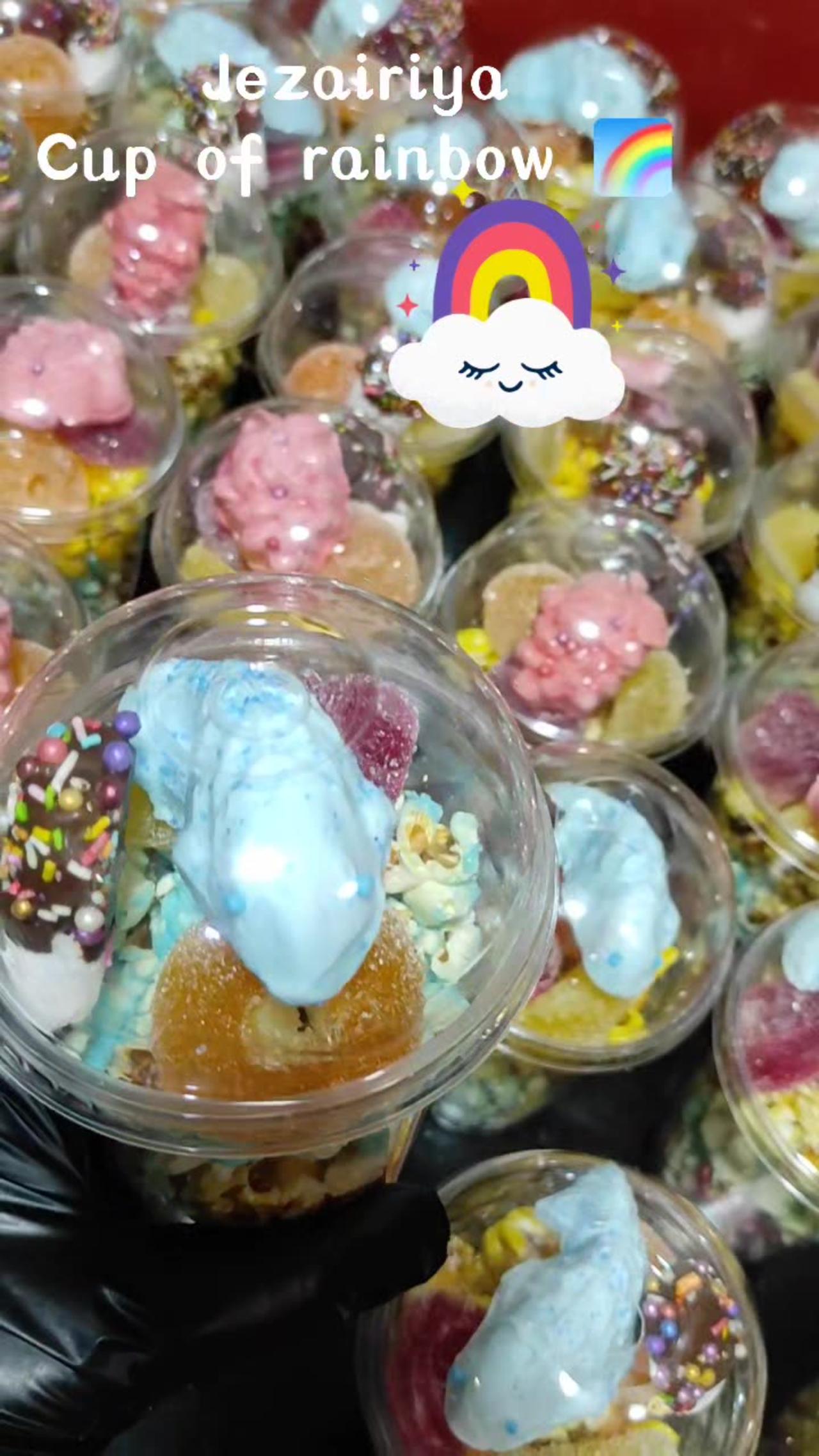 Rainbow cup of sweets and candies