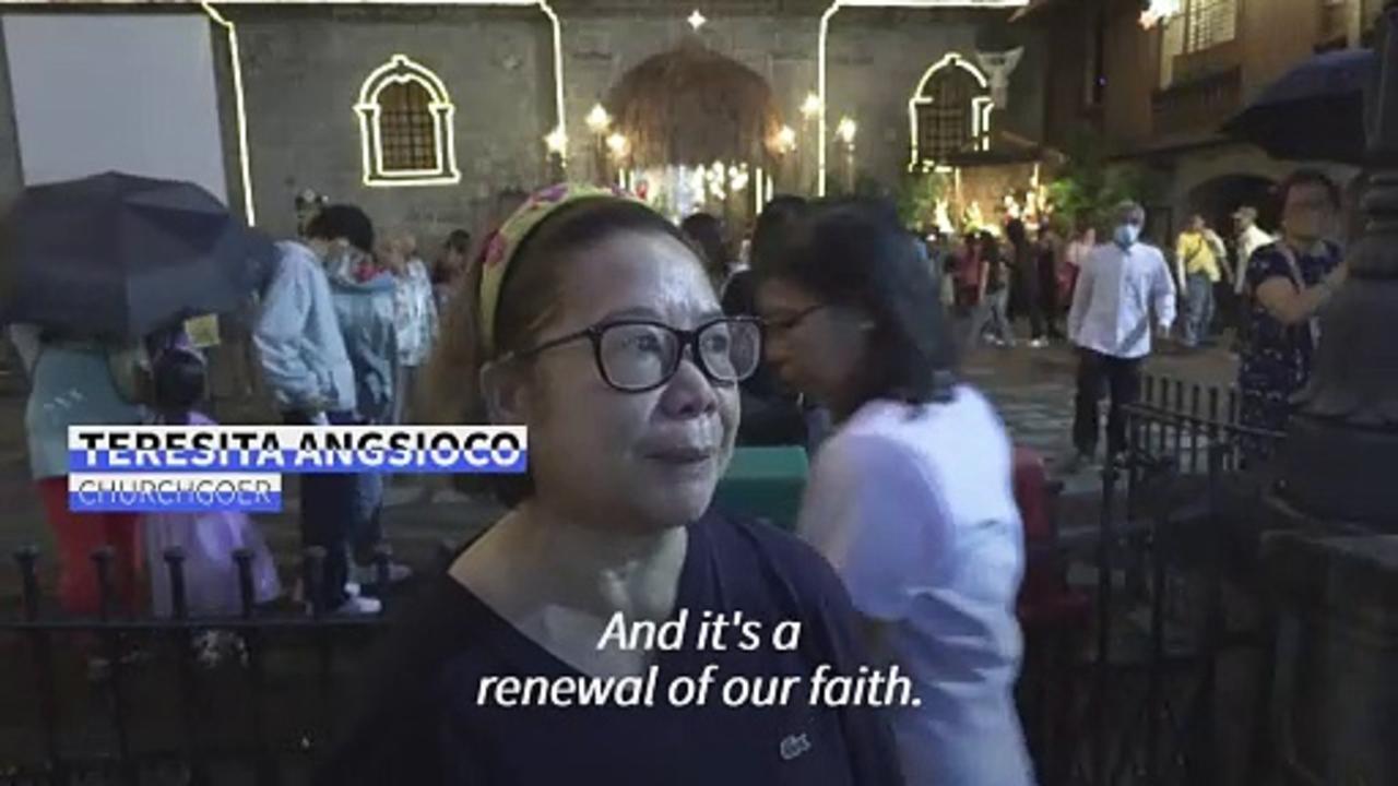 Filipino churchgoers attend pre-dawn mass in Christmas countdown