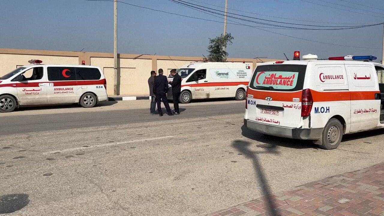 Aid trucks and ambulances in Gaza's Rafah