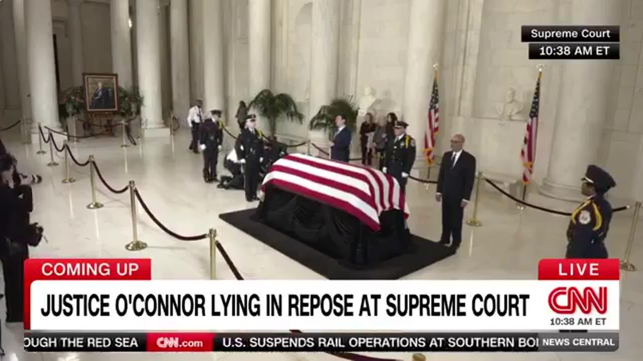 Honor guard collapses in front of the casket of Justice Sandra Day O'Connor