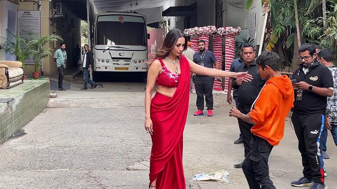 Malaika Arora’s red satin draped saree is straight out of every modern bride’s dream