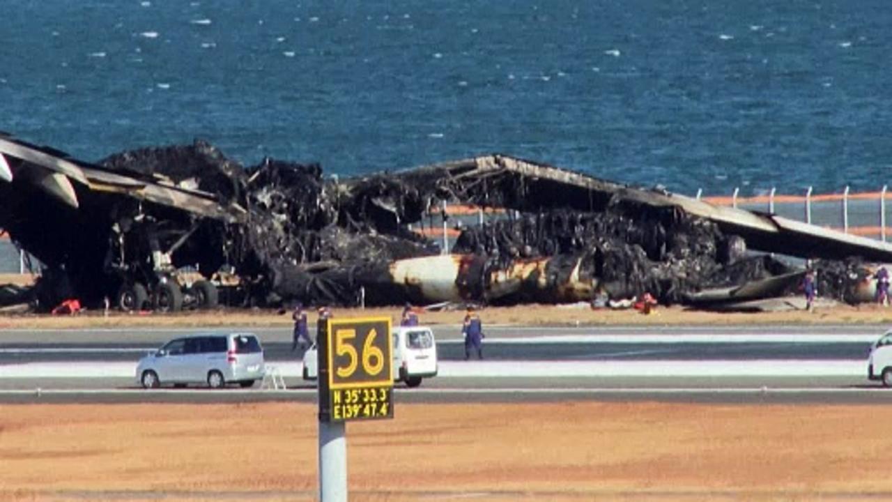 Plane wreckage after crash at Japan's Haneda airport