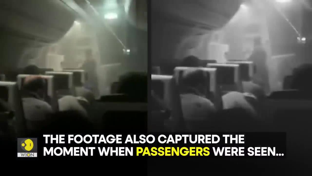 Japan airlines on fire : Video captures passengers sliding off japan airlines plane on fire