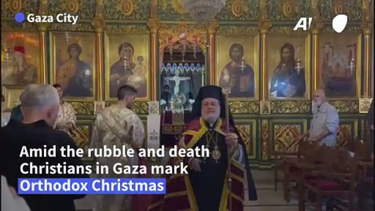 Gaza City residents attend Orthodox Christmas mass as war rages in the besieged territory