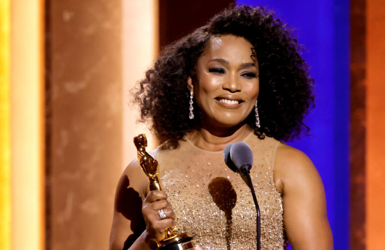 Angela Bassett thanked her fans for their 'decades and decades' of support as she accepted an honorary Oscar.