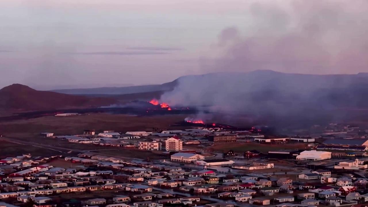 Drone footage of molten lava burning Iceland houses