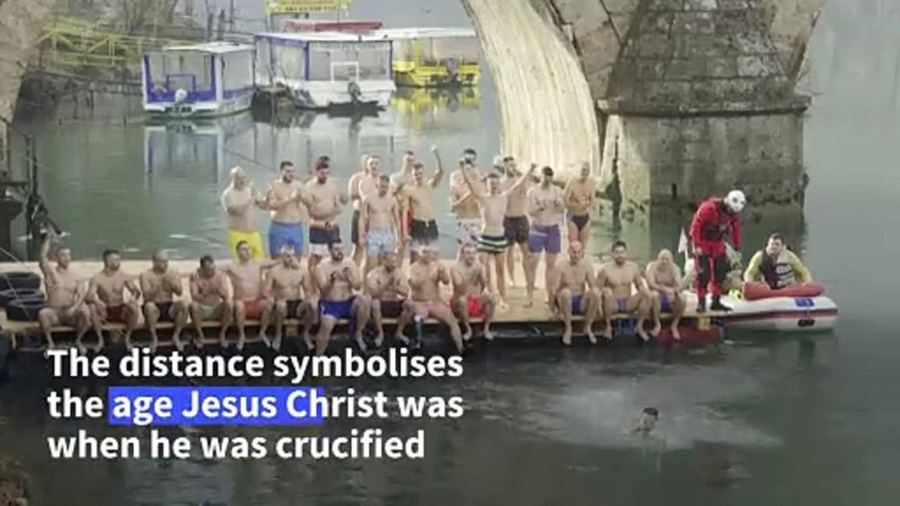 A swimming race to the cross as Bosnia's Christians mark Epiphany