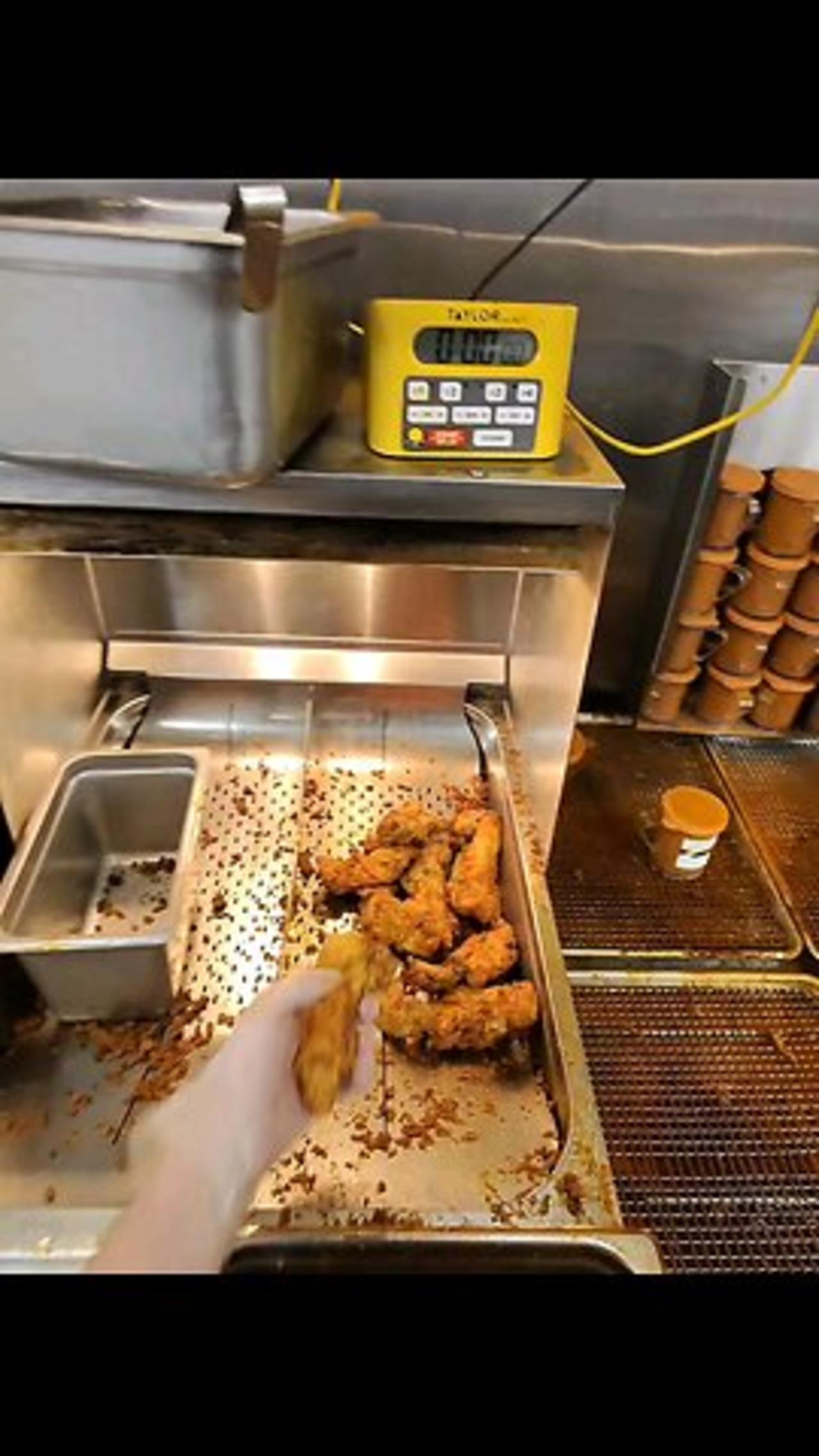 me working at Dave's Hot Chicken
