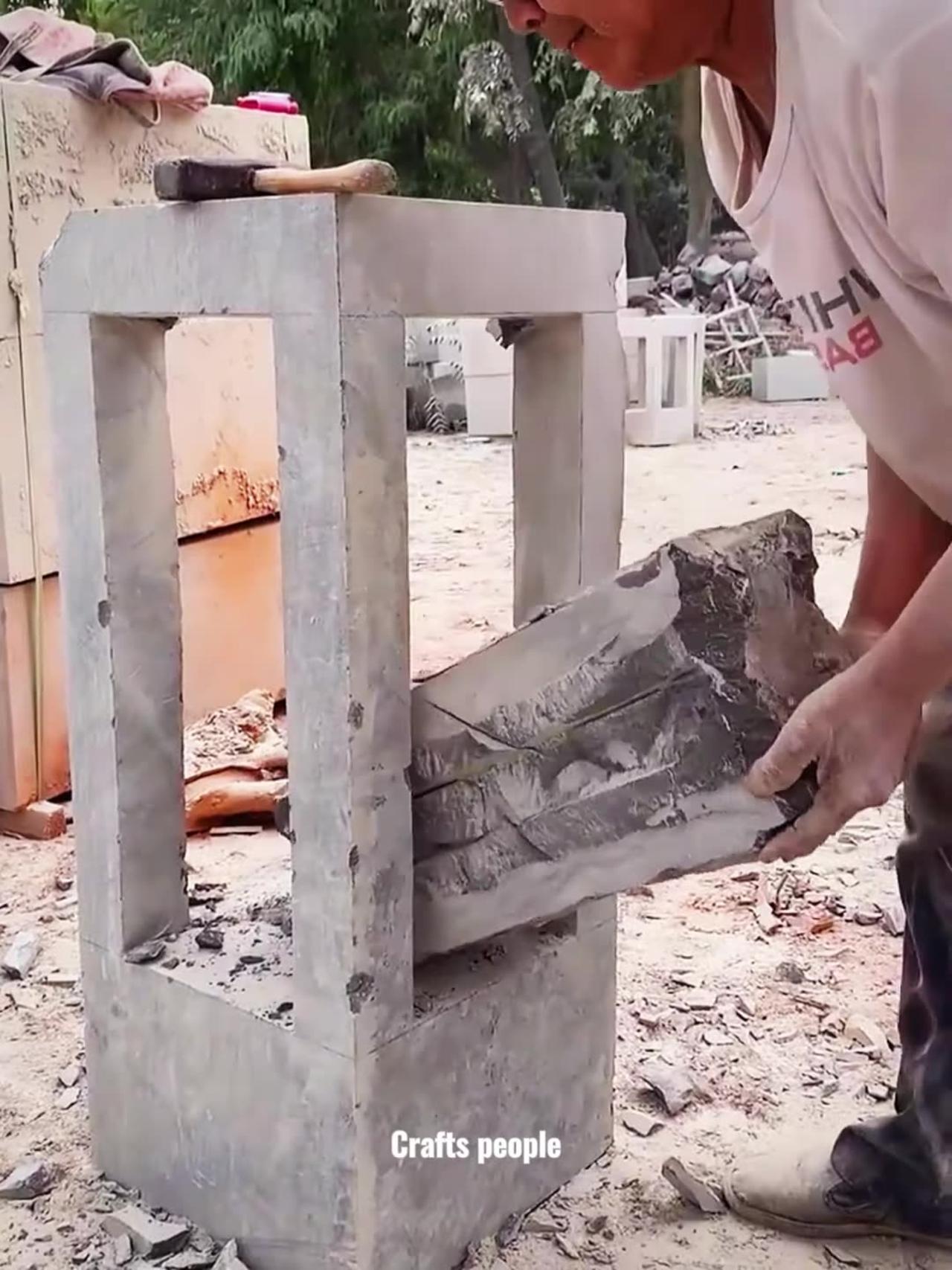 A hammer and chisel carved out a stone stool