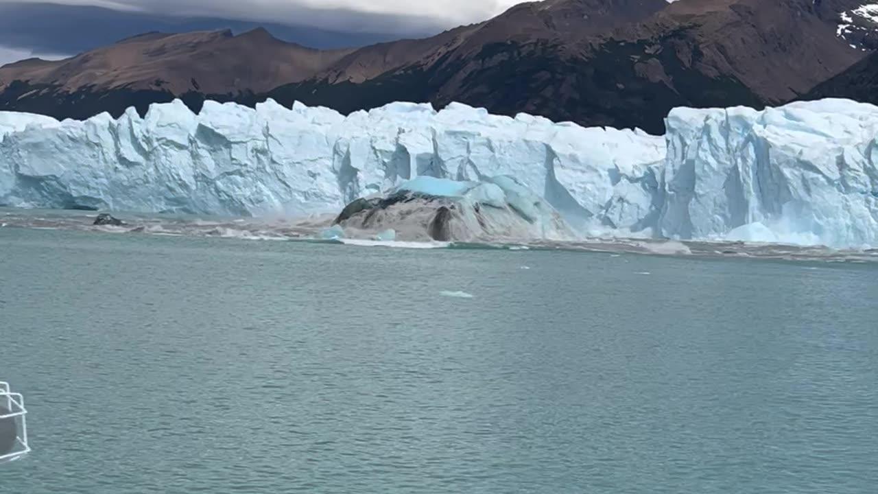 Sightseers Watch Iceberg Emerge From the Perito Moreno Glacier