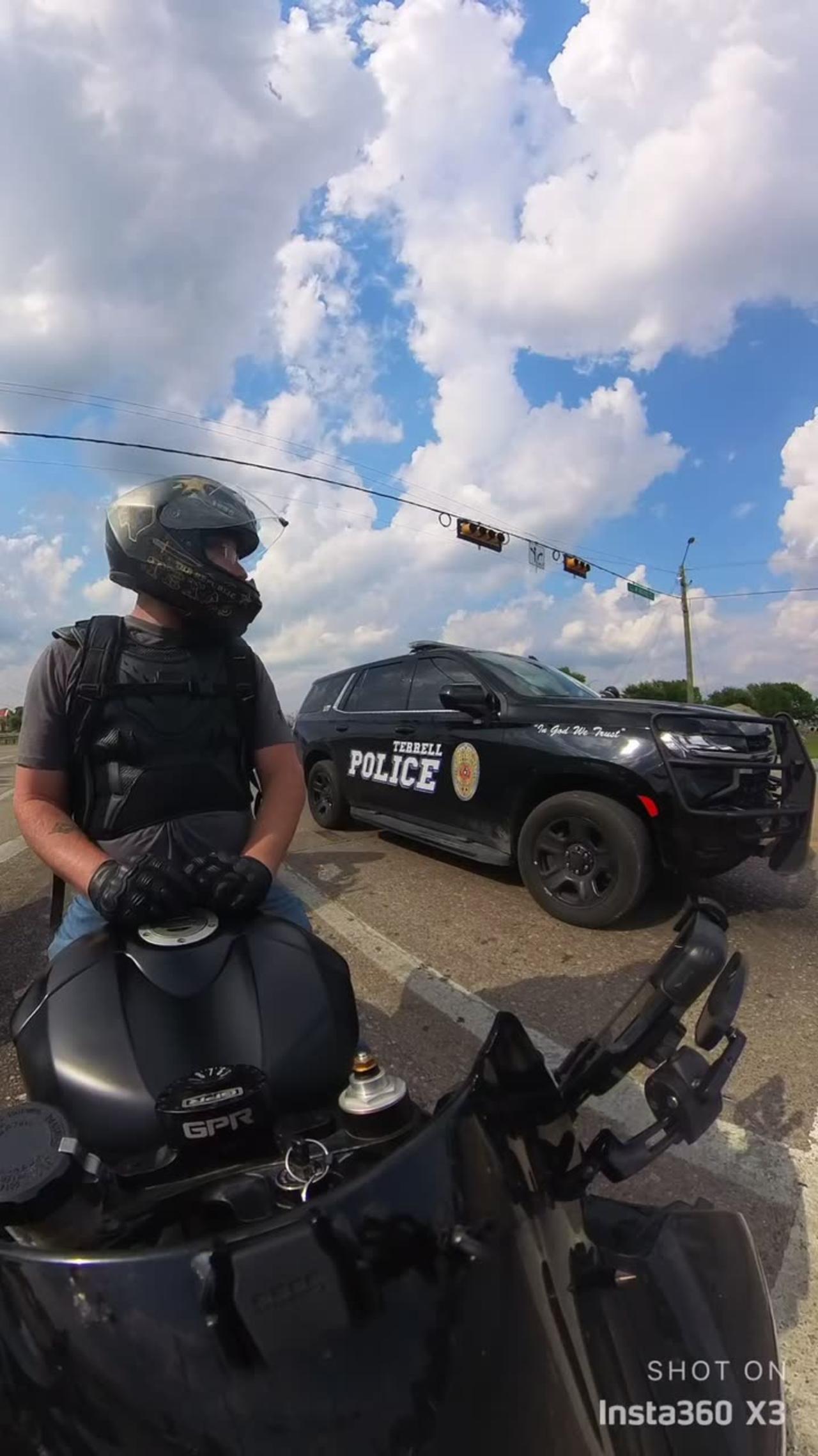 Cop Revs Engines With Motorcyclist