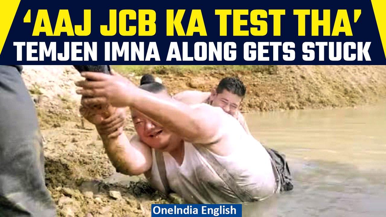 Viral: Nagaland’s Temjen Imna Along’s struggle to get out of muddy pond has a JCB twist | Oneindia
