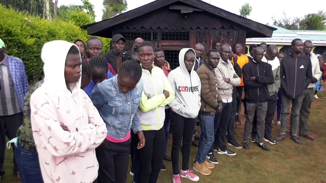 Relatives, friends of Kenyan marathon world record-holder mourn his death