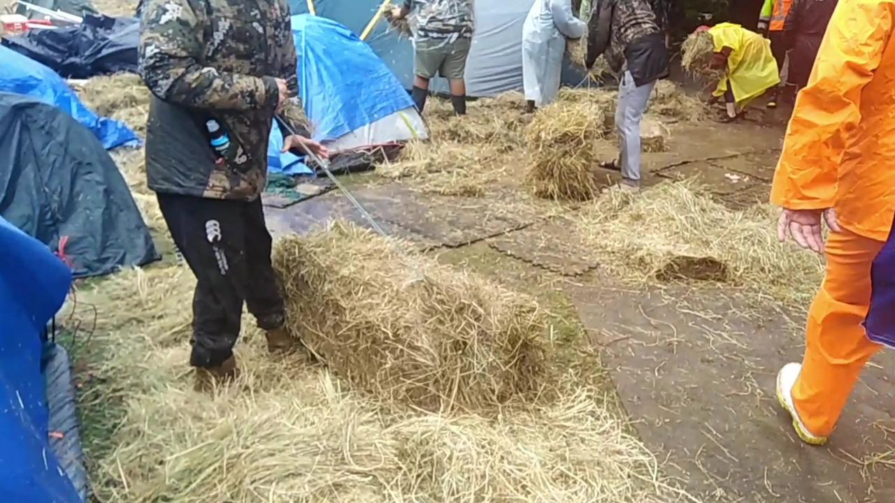 This Time Last Year: Laying Hay on Waterlogged Parliament Grounds During Cyclone Dovi