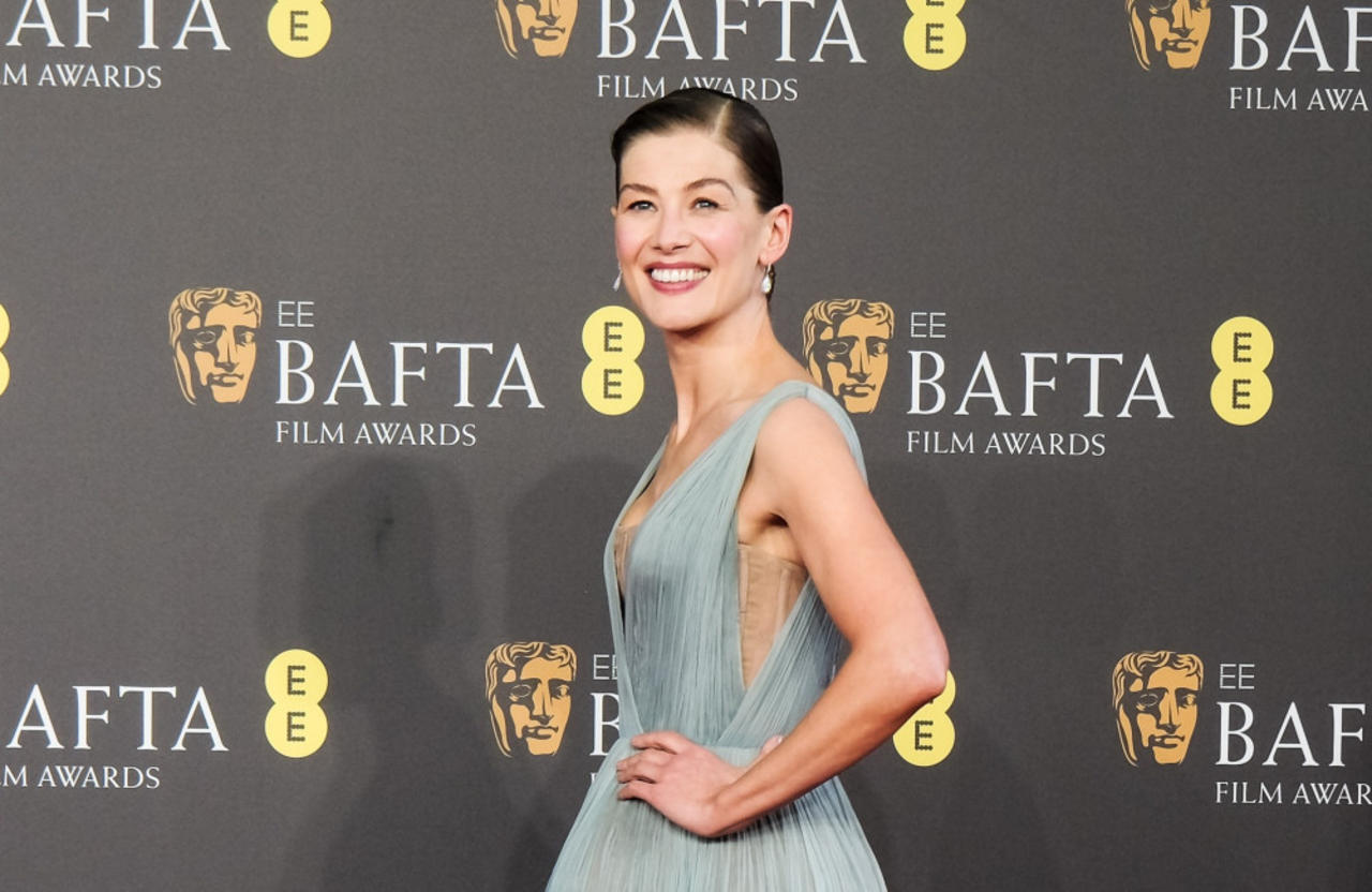 Rosamund Pike felt it was 'important' to wear a female designer to the BAFTA Awards