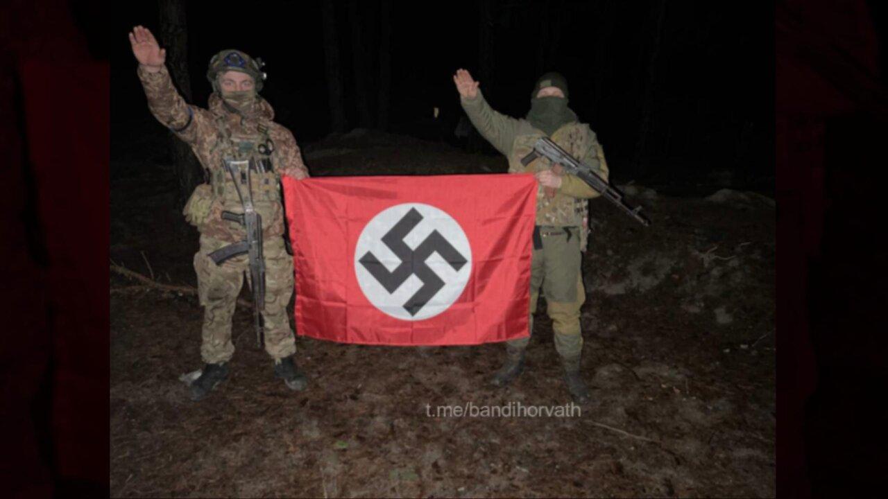 Ukrainian Nazis with Swastika flags.