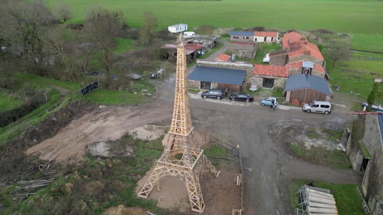 Friends Craft 52-Foot Wooden Eiffel Tower for Olympics
