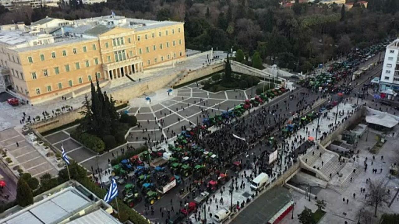 Greek farmers drive tractors to parliament