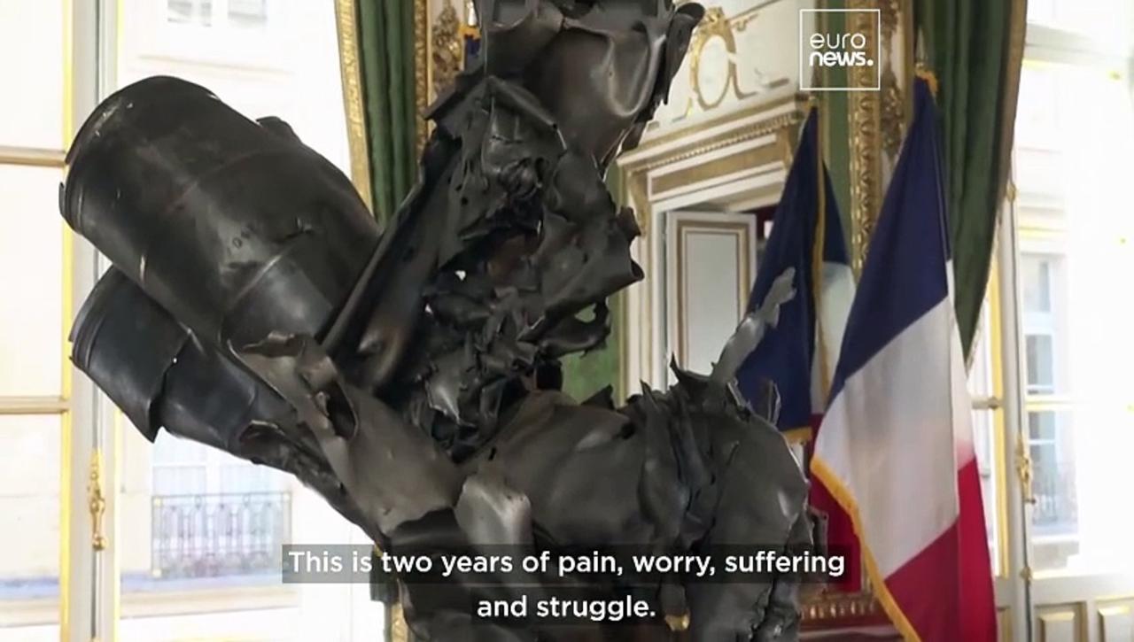 Ukrainian sculptor's haunting artworks made from war debris go on display in Paris