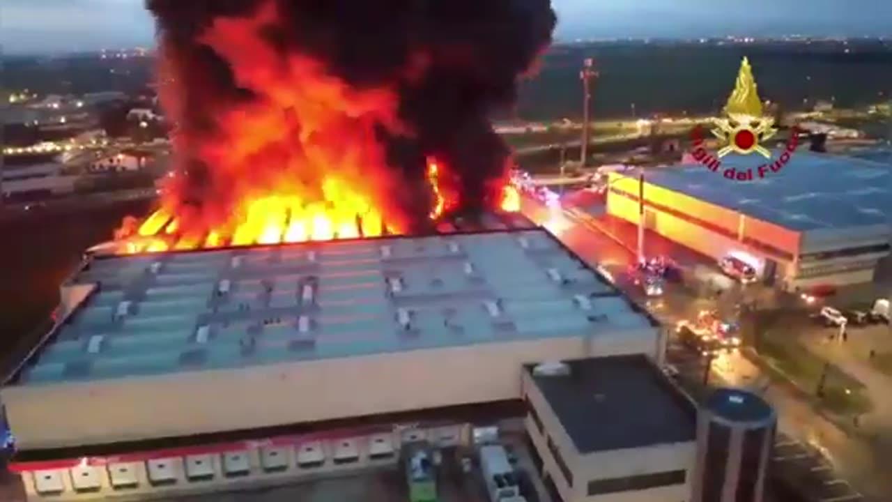Massive fire has erupted at an industrial warehouse in Truccazzano, near Milan, Italy.