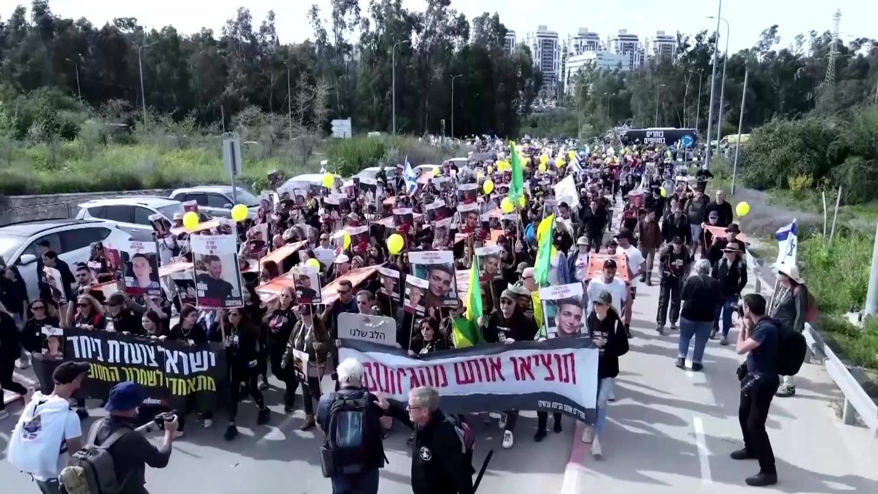 Israelis march with 134 stretchers for Gaza hostages