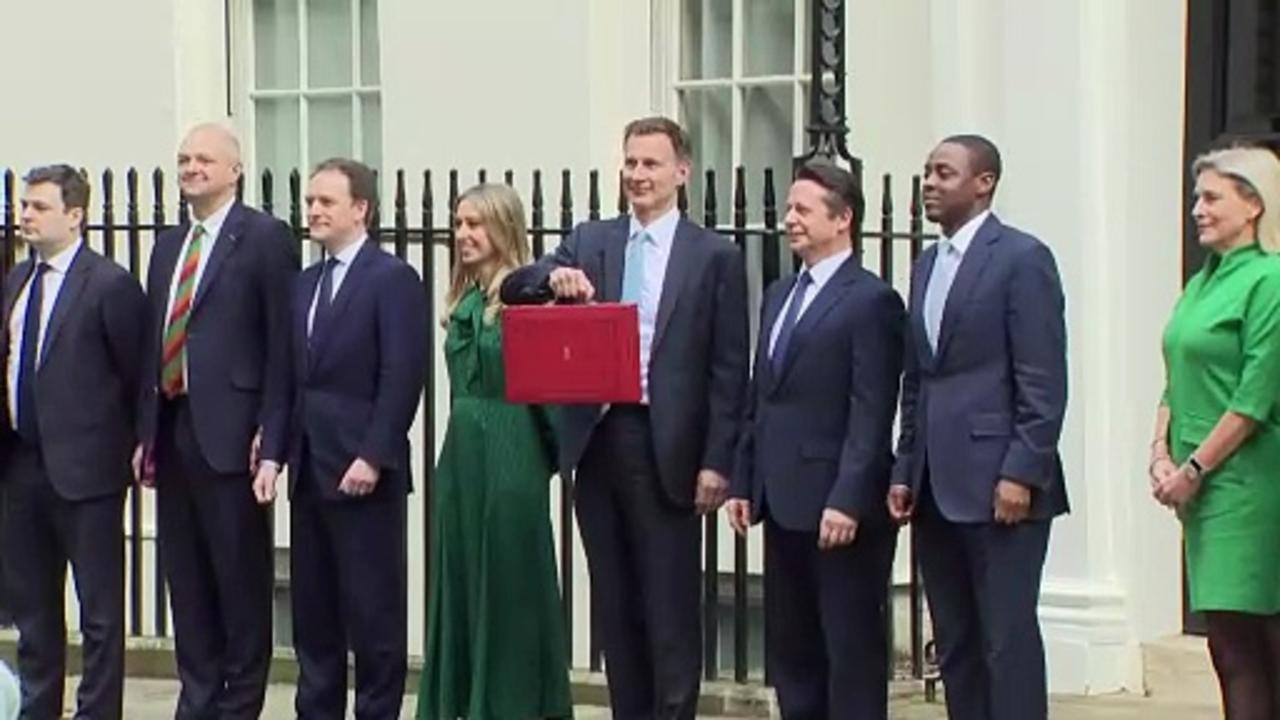 Chancellor poses with red box ahead of Budget
